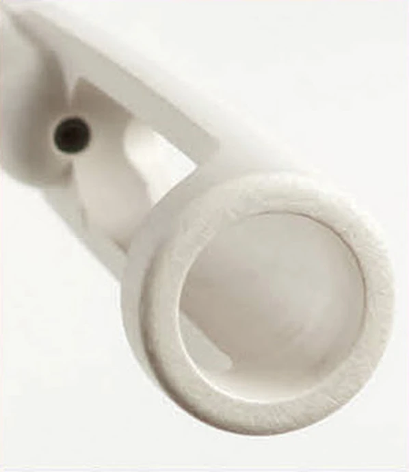 Close-up of the rotating shielded tip on the DentalJect applicator